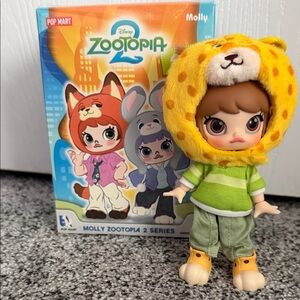 Disney Zootopia 2 Molly Doll with Yellow Hood and Green Outfit cheetah outfit